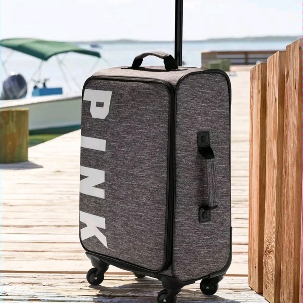 Pink wheelie suitcase